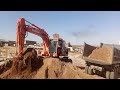 fastest excavator operator ever loading truck heavey machinary