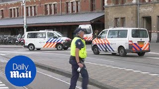 Dutch police surround Amsterdam central station after attack