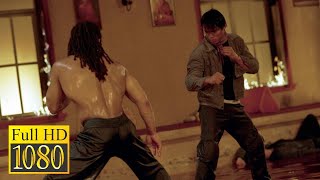Tony Jaa fights with a Capoeira master in a Buddhist temple in the movie Tom-Yum