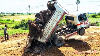 Incredible Action Small Dump Truck Unloading Dirt And Old Bulldozer Pushing Dirt Fill Up Into Fields