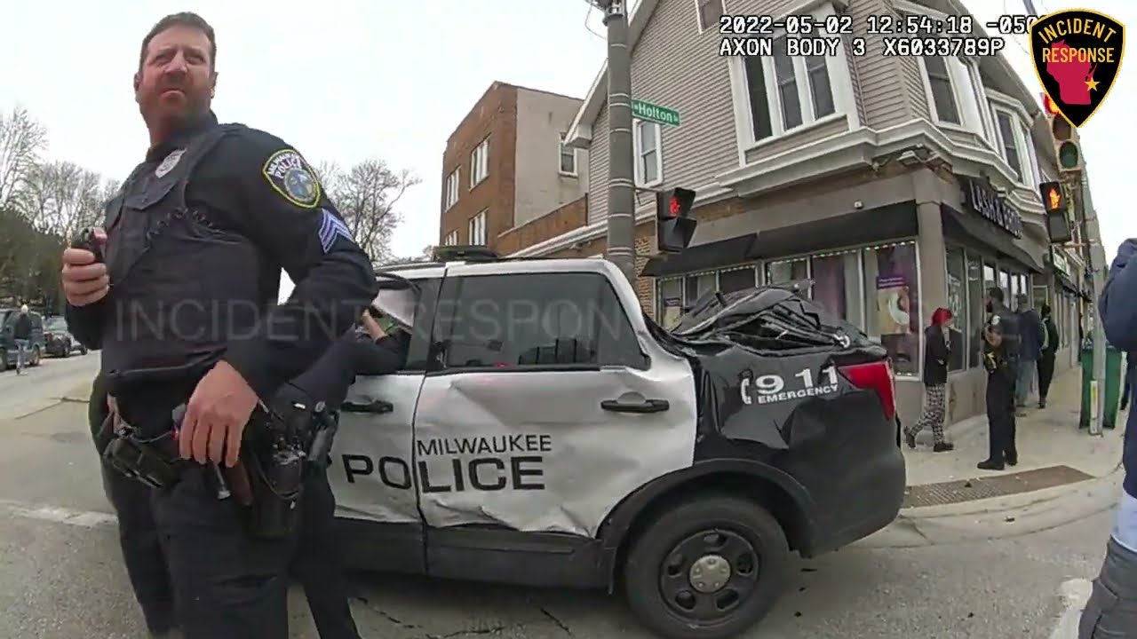 Dash Cam: Reckless Driver Crashes Into Milwaukee Police Officers - YouTube