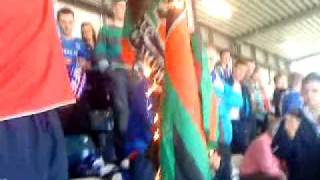 linfield fans burning glentoran flag