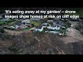 ‘It’s eating away at my garden’ – drone images show homes at risk on cliff edge