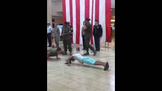 LITTLE GIRL BEATS CADET IN PUSH UP CONTEST