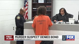 Murder suspect denied bond after body found in burning car