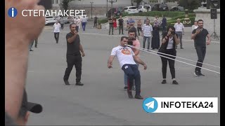 В Степанакерте установлен новый мировой рекорд. Ашот Ханоян вытянул зубами сразу 35 машин