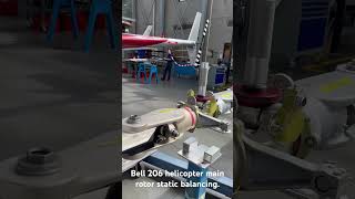 Helicopter main rotor static balance. #bell206