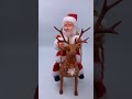 Decoração natalina: Papai Noel montado em rena