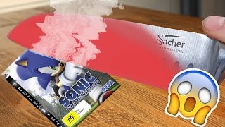 EXPERIMENT 1000 DEGREE GIANT RED HOT KNIFE CUT THROUGH BAD VIDEO GAMES!