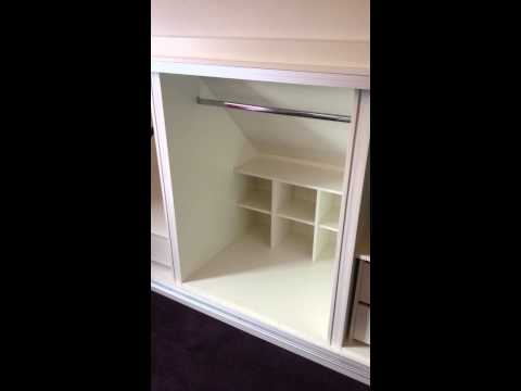 Sliding wardrobe fitted in a dormer style home Sliding wardrobe fitted in a dormer style home