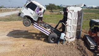 NEW! Unbelievable Accident Dump Truck Drive Back Uploading Fly Overturned While Unloading Soil