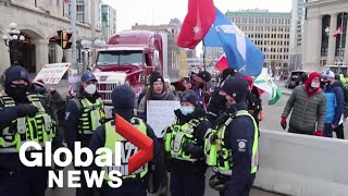 Trucker protests: Demonstrators confront Ottawa police as they hand out citations