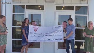 Fredericksburg High School students give Six Flags trip savings to local food bank