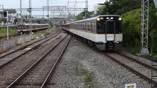 高の原駅を発車および入線する近鉄電車