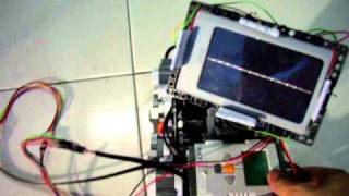 LEGO NXT-- traces sun light to use solar energy to  charge the battery!!