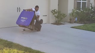 FULL VIDEO: Florida man traps alligator in garbage bin, releases it near lake