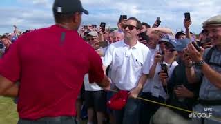 Tiger Woods hits a fan with his ball at The Open Championship