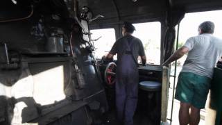 Inside the engineer's cab of a Bulgarian State Railways Class 03.12 steam locomotive