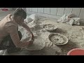 grandmother and a stranger make slippers for masoud