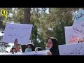 afghan crisis taliban thump afghan women protesting for equal rights snatch their posters