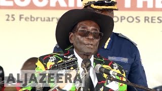 At 93rd birthday bash, Robert Mugabe says he won't quit