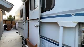 1999 Trailmanor 2518 pop up camper walkaround