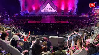 Aespa members play with smartphones at the BLACKPINK concert