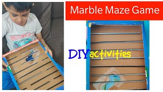 DIY Toddler Activity I Simple cardboard straws and marble maze game I Hand Eye Coordination