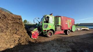 Modern straw laying technologies  Milking  Silo hills  Holstein cows  Big cars, cleaning the barn ,