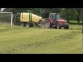 Krone Comprima Baling Grass on the local Soccer Field in Pallaskenry