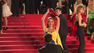 Cannes: Woman pours fake blood on herself on Palais des Festivals steps | AFP