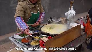 路边卖煎饼果子的大妈，一个月能够赚多少钱？