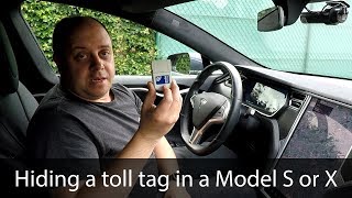 Hiding a working toll tag in a Tesla Model S or X