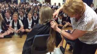 Getting a hair cut for World's Greatest Shave at school