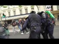Raw: Police Clash With Protesters in Paris