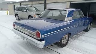 the 1964 ford  fairlane out in the snow...