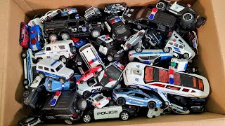 Box Full Of Police Car Diecast Cars Large collection of police diecast cars from different countries