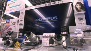 Ex-CEO tells Olympus board to step down