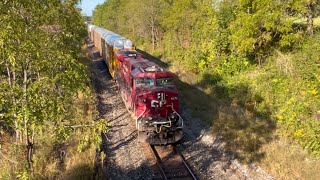 Denfield road, eastbound CPKC goes after westbound train clears. Locomotive 8810