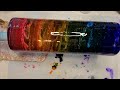 testing let s resin alcohol inks on a black base tumbler