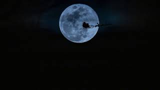 Santa flying over the moon