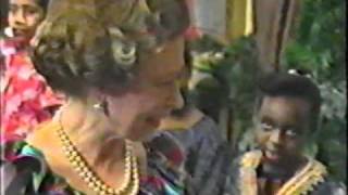 The Queen of England talks to children