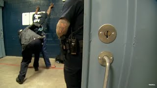 See how the Denver jail's intake process works