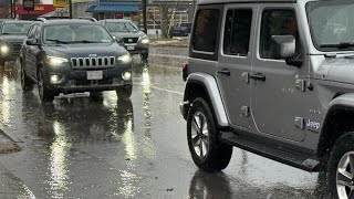 Heavy rain causes street flooding in Watertown