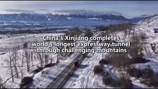 China's Xinjiang completes world's longest expressway tunnel through challenging mountains