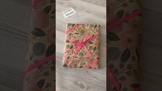 How to wrap a gift! This beautiful wrapping paper is by Ruspepa. The link is in the description #diy