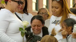 Murdered Lawrence mother remembered at emotional vigil