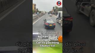 A taxi blocked the road and crawled slowly down the highway, leaving the entire line of cars behi...