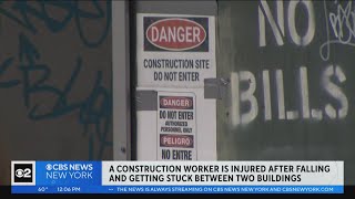 Construction worker falls between two buildings