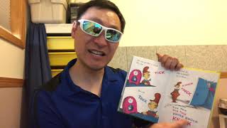 Mr. Yu can Moo: Mr. Yu reading a Dr. Seuss book